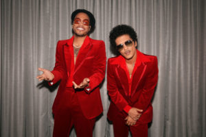 LOS ANGELES, CALIFORNIA - NOVEMBER 21: (L-R) In this image released on November 21, Anderson .Paak and Bruno Mars of Silk Sonic are seen backstage for the 2021 American Music Awards at Microsoft Theater broadcast on November 21, 2021 in Los Angeles, California.