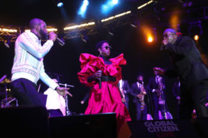 NEW YORK, NEW YORK - SEPTEMBER 22: Pras, Lauryn Hill and Wyclef Jean of The Fugees perform at Global Citizen Live at Pier 17 on September 22, 2021 in New York City.