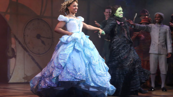 NEW YORK, NEW YORK - FEBRUARY 14: Brittney Johnson as "Glinda" and Lindsay Pearce as "Elphaba" in "Wicked" on Broadway at The Gershwin Theater on February 14, 2022 in New York City. Johnson takes her first bow and makes broadway history as the very first full-time "Glinda" played by a woman of color.