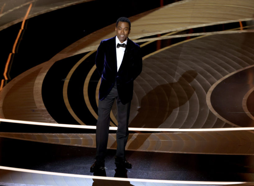 HOLLYWOOD, CALIFORNIA - MARCH 27: Chris Rock speaks onstage during the 94th Annual Academy Awards at Dolby Theatre on March 27, 2022 in Hollywood, California.