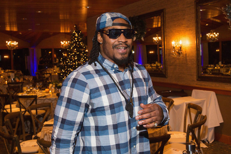 SEATTLE, WA - DECEMBER 14: Seattle Seahawks Running Back Marshawn Lynch attends the FAM 1st FAMILY FOUNDATION Charity Event at The Edgewater Hotel on December 14, 2014 in Seattle, Washington.