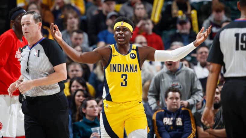 Aaron Holiday #3 of the Indiana Pacers reacts after being called for a foul against the Toronto Raptors