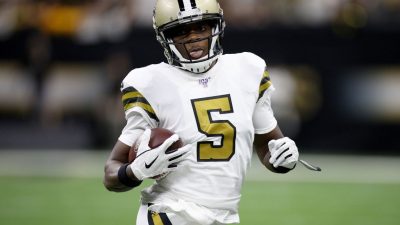 Teddy Bridgewater #5 of the New Orleans Saints runs the ball against the Dallas Cowboys