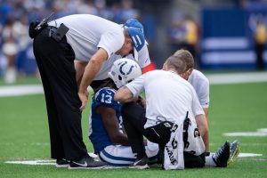The Colts athletic training staff looks at T.Y. Hilton during a 2019 game.