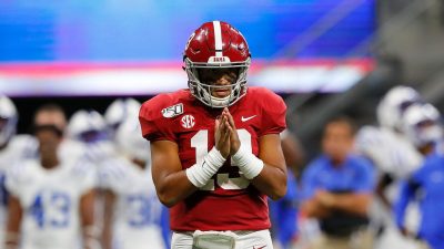 Tua Tagovailoa #13 of the Alabama Crimson Tide reacts after passing for a touchdown in the second half against the Duke Blue Devils at Mercedes-Benz Stadium