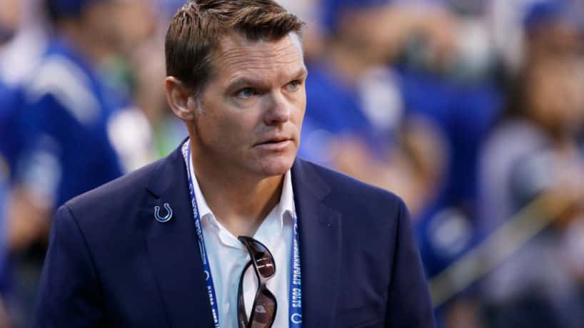 Colts general manager Chris Ballard walks on the sideline before a home game.