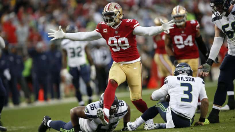 New Colts defensive lineman DeForest Buckner celebrates after a play in Seattle.