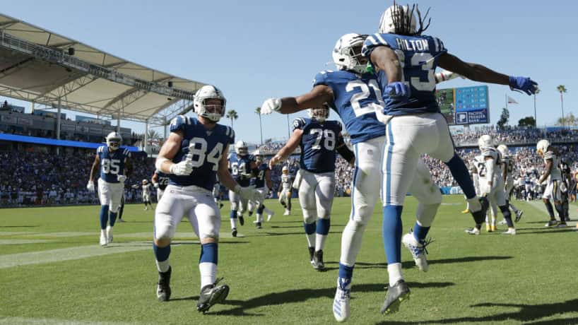 Colts players celebrate after a big play in 2019.