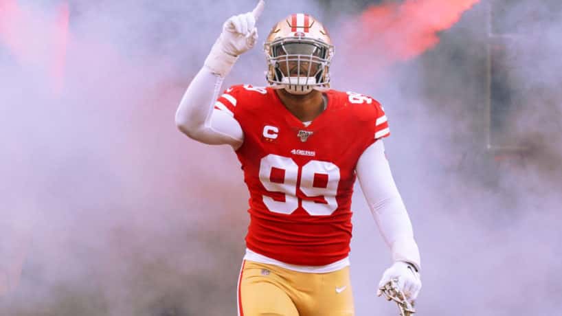 49ers defensive end DeForest Buckner runs out of the tunnel in 2019.