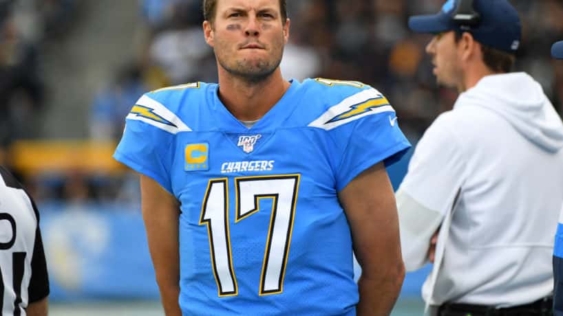 Chargers quarterback Philip Rivers looks on from the sideline.