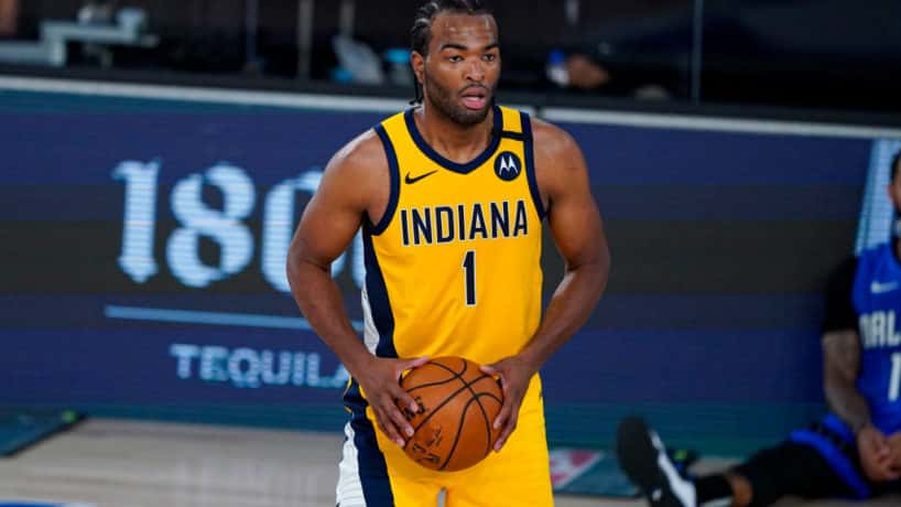 Pacers forward T.J. Warren looks to pass in a bubble game in Orlando.