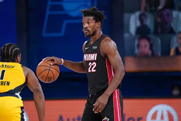 Miami forward Jimmy Butler dribbles the ball.
