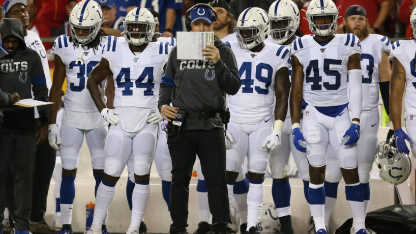 Indianapolis Colts defensive coordinator Matt Eberflus looks to his play sheet while making a call in the second quarter of an NFL matchup between the Indianapolis Colts and Kansas City Chiefs on October 6, 2019 at Arrowhead Stadium in Kansas City, MO