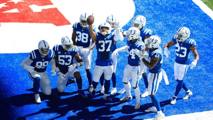 Colts defenders celebrate an INT.