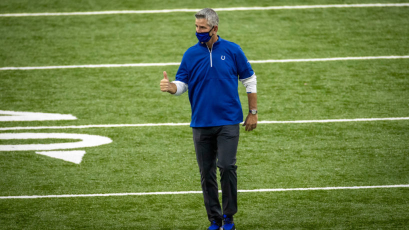 Colts head coach Frank Reich offers a thumbs up walking off the field.