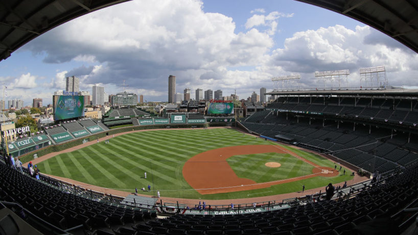 An empty Wrigley Field with cloud coverage above prepares to host Game 1 of the NL Wild Card Series between the Cubs and Marlins