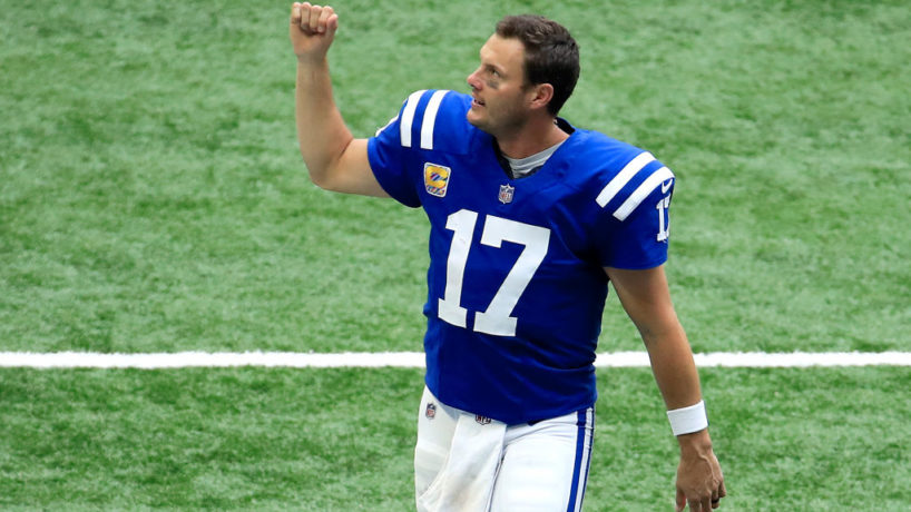 Colts quarterback Philip Rivers pumps his fist walking off the field.