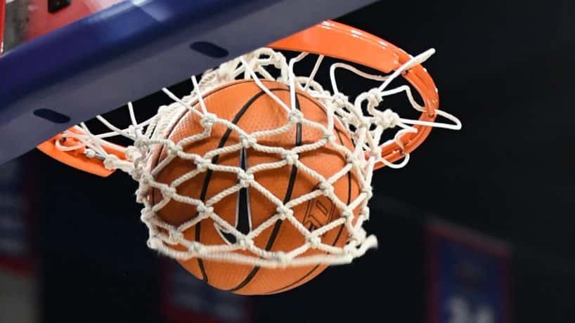 Basketball going through a hoop
