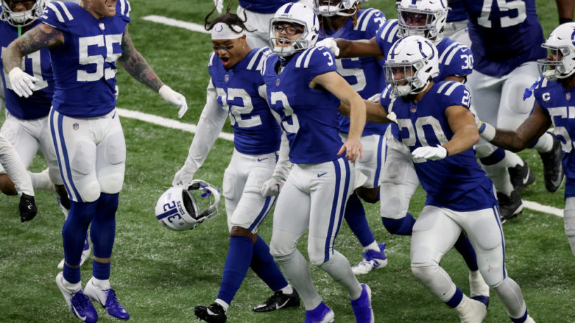 Colts players celebrate big win over Packers.