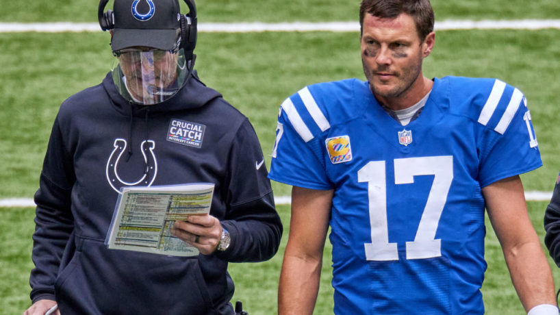 Colts head coach Frank Reich and Philip Rivers chat.