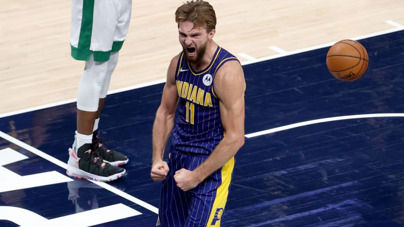 Domantas Sabonis celebrates after converting the game winning bucket over the Boston Celtics