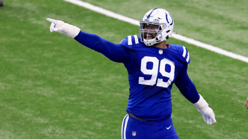 Colts DT-DeForest Buckner points to the crowd after a big play.