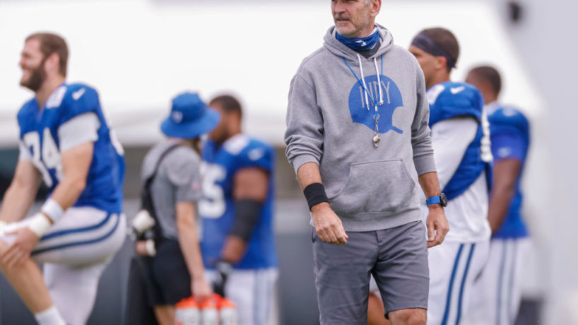 Colts head coach Frank Reich walks around before practice.