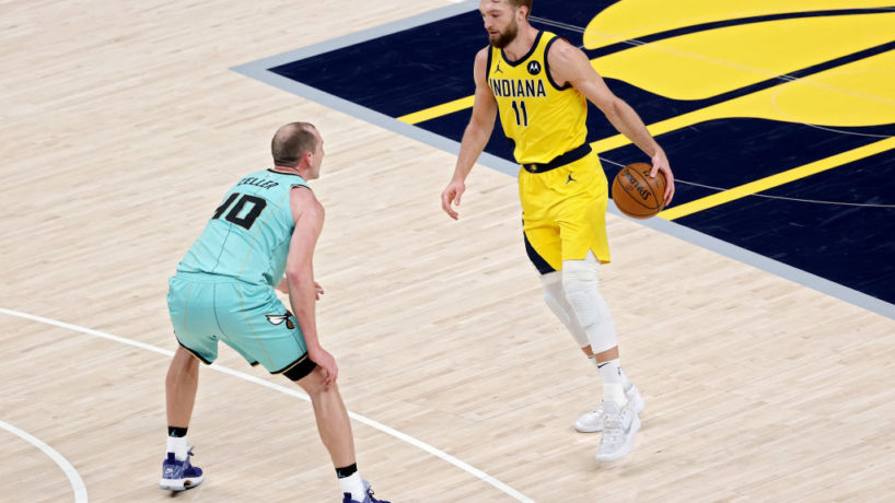 Pacers forward Domantas Sabonis tries to drive in a game.