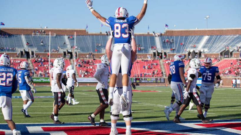 SMU TE-Kylen Granson gets lifted in the air after a touchdown.