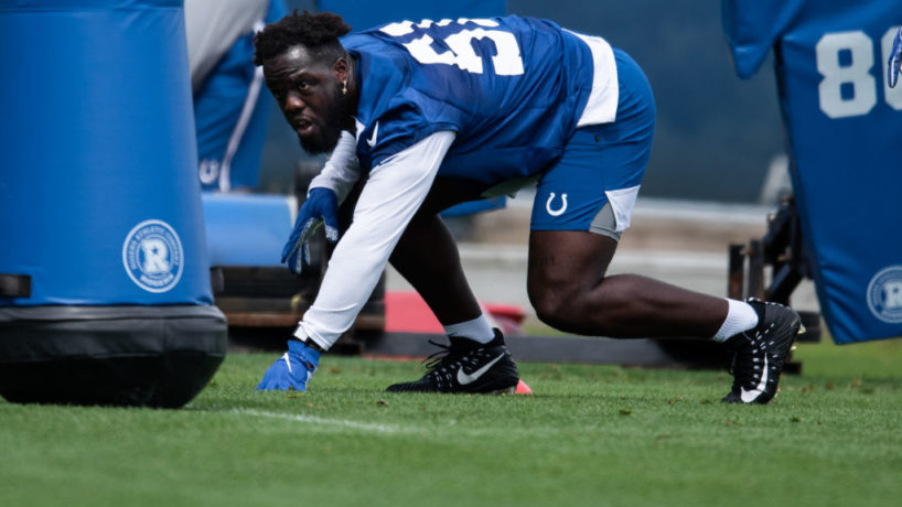 Colts DE-Kwity Paye lines up in practice.