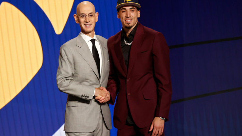 Chris Duarte looks onward and shakes the hand of NBA Commish Adam Silver moments after being drafted by the Indiana Pacers
