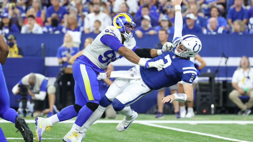 Colts QB-Carson Wentz falls down after taking a hit.
