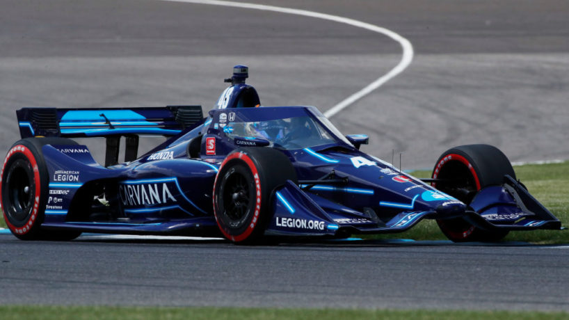 Jimmie Johnson turns in his number 48 machine in the GMR Grand Prix at the Indianapolis Motor Speedway