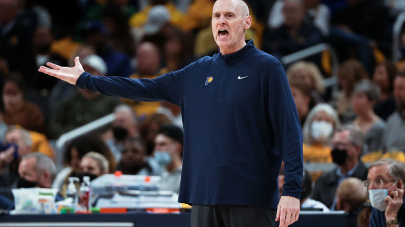 Rick Carlisle on the Pacers sideline shouts in the direction of the floor