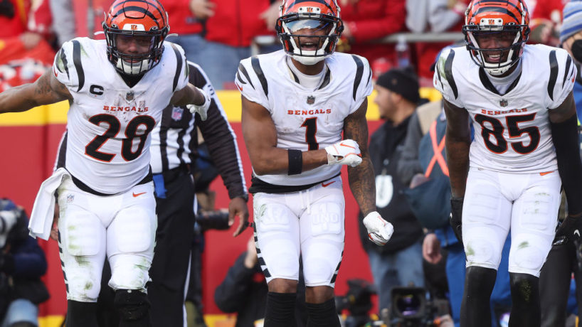 Ja'Marr Chase celebrates in the end zone with two Bengals teammates in the AFC Championship against the Chiefs