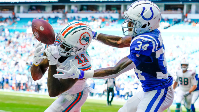 DeVante Parker battles with a Colts cornerback in the end zone as he is thrown the football