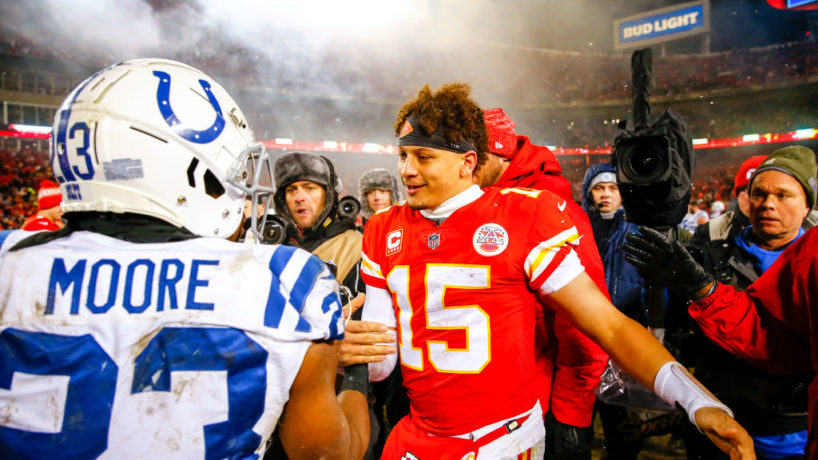 Patrick Mahomes and Kenny Moore shake hands after a game.