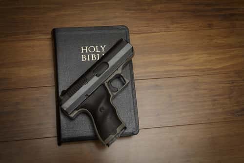 gun on a bible