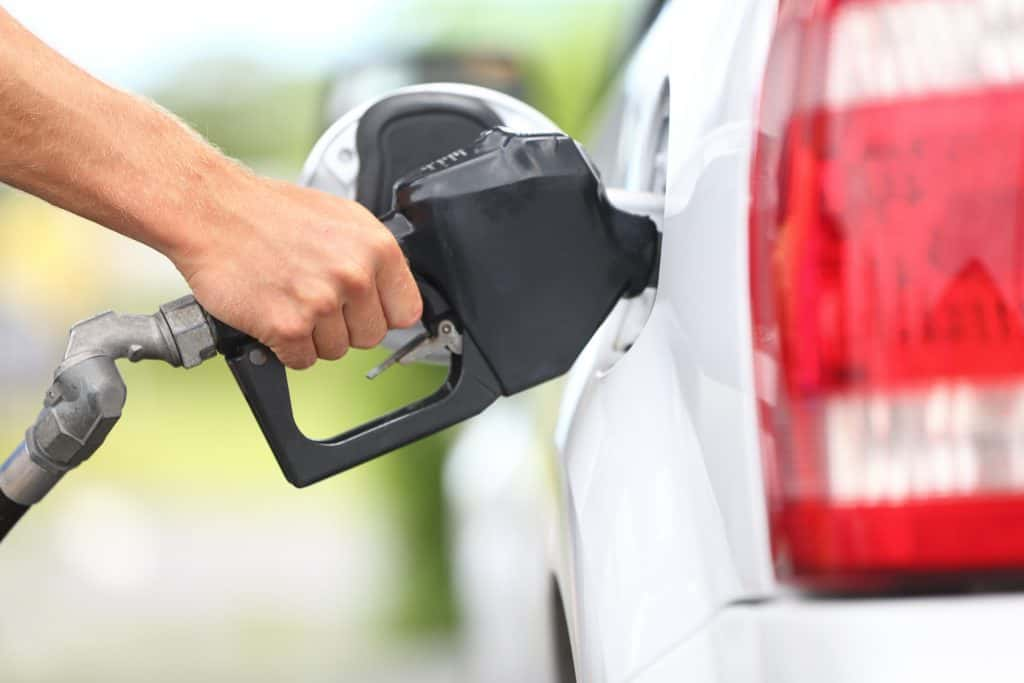 Person pumping gas