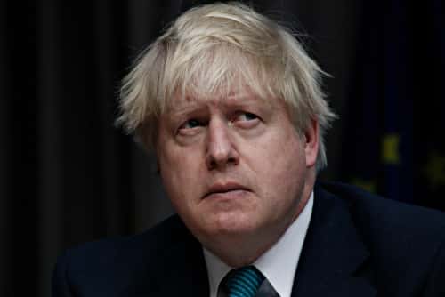 UK's Johnson weakened by party defections over Brexit