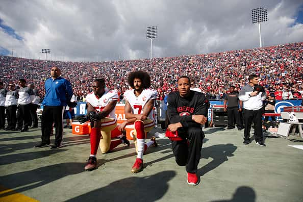 San Francisco 49ers v Los Angeles Rams People: Eli Harold, Colin Kaepernick, Eric Reid: Getty Images