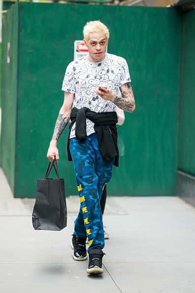 Pete Davidson walking down a New York City street