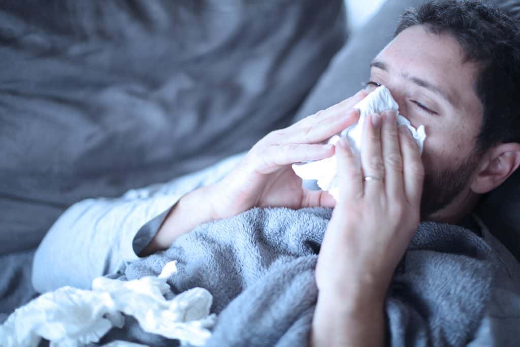 Man sick with the flu