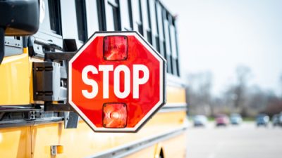 Yellow School Bus with Red Stop Sign
