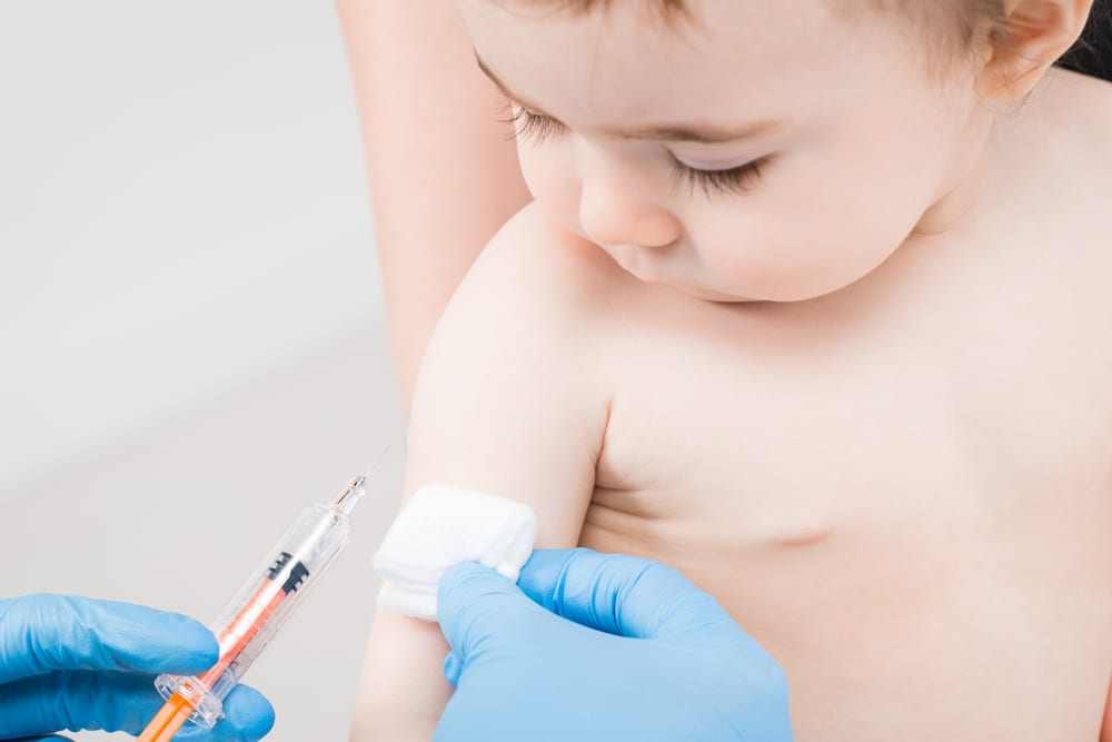 Child being vaccinated