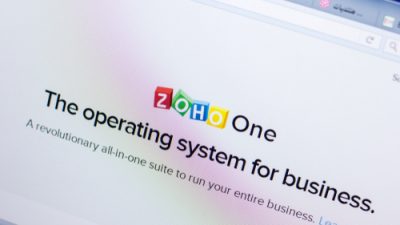 Website page that reads "Zoho One, The operating system for business"