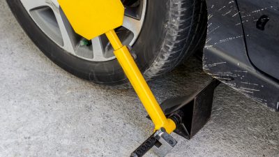 Cap on booting removal fees moves one step closer to reality