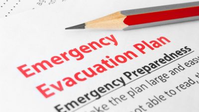 Pencil on paper that reads "Emergency Evacuation Plan"