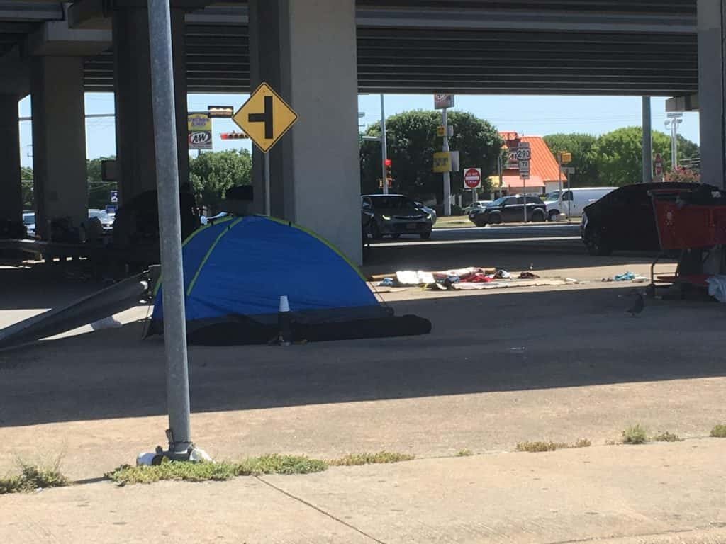 homeless camping site under 290 bridge