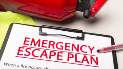 clipboard that reads "emergency escape plan"